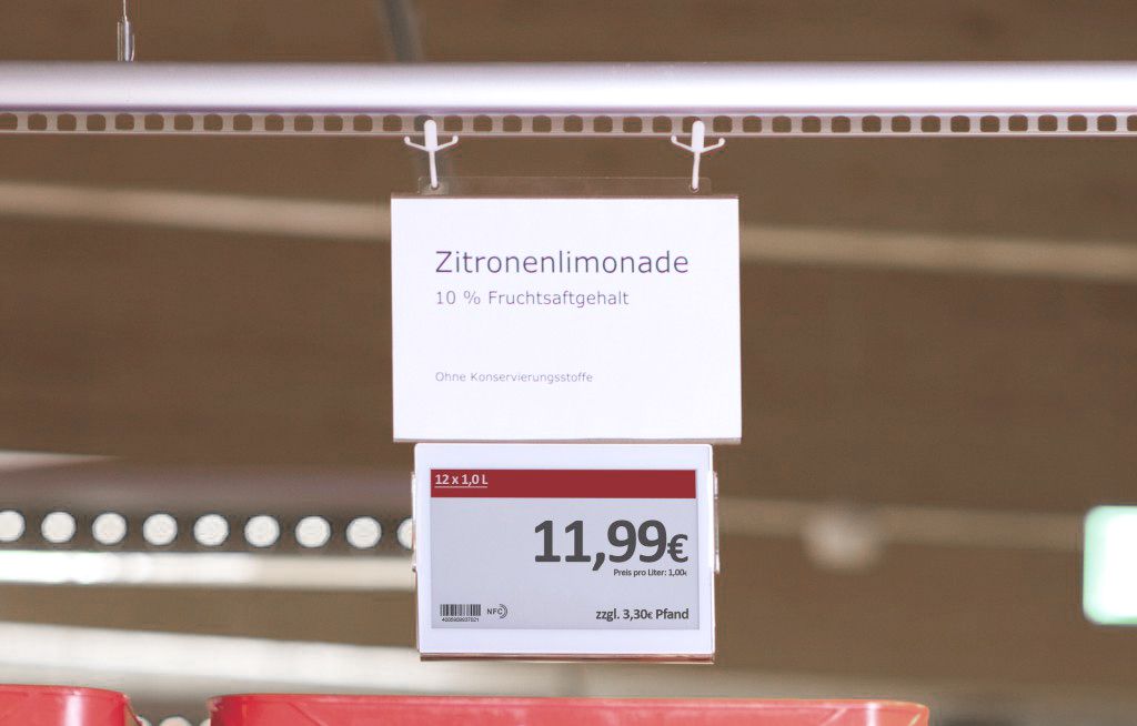 Digital Price Labels Attached to the Ceiling Rail