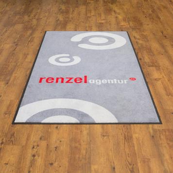 https://www.vkf-renzel.com/out/pictures/generated/product/2/356_356_75/r16003612-07/washable-mat-with-logo-doormat-4974-2.jpg